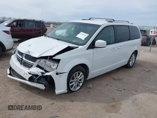 2018 Dodge Grand Caravan SXT with VIN 2C4RDGCG2JR283490, listed as a IAAI auction lot 41796929 with 157,836 mi miles and . Bid and sale history available at DreamBid. Image 17.