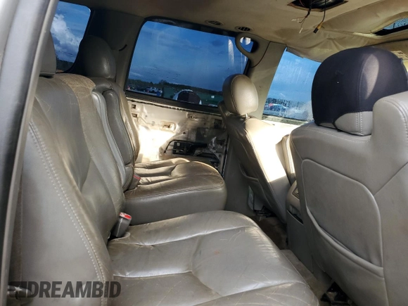 2004 Chevrolet Suburban LT with VIN 1GNEC16Z24J118695, listed as a Copart auction lot 52744505 with 306,940 mi miles and Salvage title. Bid and sale history available at DreamBid. Image 11.
