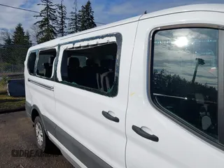 2023 Ford Transit Passenger XL with VIN 1FBAX2Y84PKB08369, listed as a IAAI auction lot 41501636 with 16,967 mi miles and . Bid and sale history available at DreamBid. Image 6.