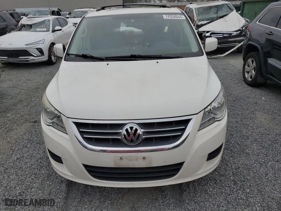 2009 Volkswagen Routan SE with VIN 2V8HW34139R582544, listed as a Copart auction lot 74354054 with 136,528 mi miles and Salvage Title. Bid and sale history available at carsss.com. Image 5.
