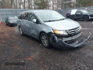 2014 Honda Odyssey EX z VIN 5FNRL5H40EB054085, wystawiony jako IAAI lot #41075770 z przebiegiem 100 001 mil mil oraz . Historia ofert i sprzedaży dostępna na DreamBid. Obrazek 1.