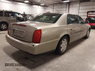2004 Cadillac DeVille z VIN 1G6KD54Y04U119341, wystawiony jako IAAI lot #42193664 z przebiegiem 162 290 mil mil oraz . Historia ofert i sprzedaży dostępna na DreamBid. Obrazek 4.