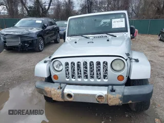 2008 Jeep Wrangler Unlimited Sahara with VIN 1J4GA59158L501099, listed as a IAAI auction lot 41743590 with 213,941 mi miles and . Bid and sale history available at DreamBid. Image 12.