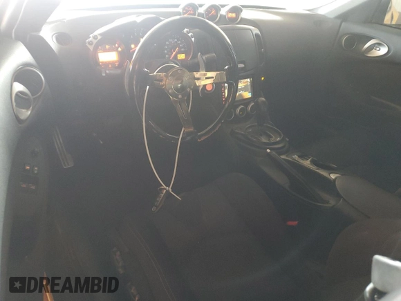 2009 Nissan 370Z with VIN JN1AZ44E09M407526, listed as a Copart auction lot 81125714 with 157,328 mi miles and Clean title. Bid and sale history available at DreamBid. Image 8.