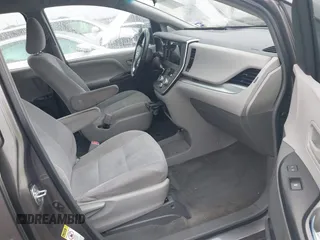 2015 Toyota Sienna L with VIN 5TDZK3DC9FS563593, listed as a IAAI auction lot 41466419 with 136,394 mi miles and . Bid and sale history available at DreamBid. Image 5.