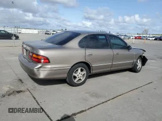 1998 Toyota Avalon XL with VIN 4T1BF18B1WU255028, listed as a Copart auction lot 51017075 with 248,911 mi miles and Salvage Title. Bid and sale history available at DreamBid. Image 3.