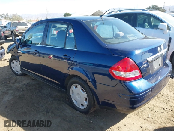 2009 Nissan Versa 1.8 S with VIN 3N1BC11E29L360857, listed as a IAAI auction lot 40629379 with 114,499 mi miles. Bid and sale history available at carsss.com. Image 3.