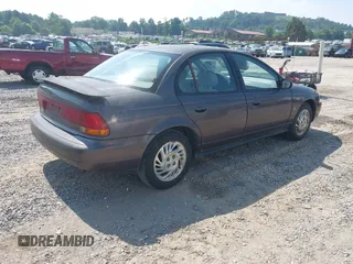 1999 Saturn SL with VIN 1G8ZK5272XZ225139, listed as a IAAI auction lot 42662628 with 223,692 mi miles and . Bid and sale history available at DreamBid. Image 4.