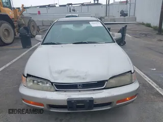 1997 Honda Accord Value with VIN 1HGCD568XVA184006, listed as a IAAI auction lot 41818518 with 276,230 mi miles and . Bid and sale history available at carsss.com. Image 12.