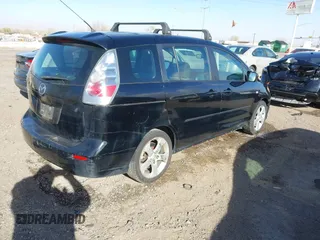 2006 Mazda 5 Sport with VIN JM1CR293560119215, listed as a IAAI auction lot 41774497 with 203,660 mi miles. Bid and sale history available at carsss.com. Image 4.
