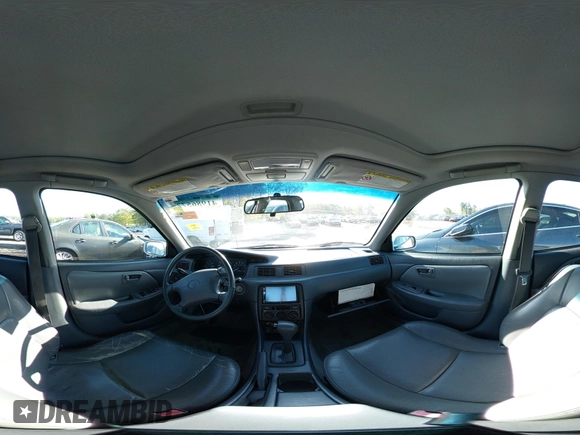 1999 Toyota Camry LE z VIN 4T1BF28K5XU930080, wystawiony jako IAAI lot #41986577 z przebiegiem 145 224 mil mil oraz . Historia ofert i sprzedaży dostępna na DreamBid. Obrazek 20.