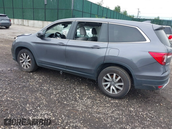 2019 Honda Pilot EX-L with VIN 5FNYF6H5XKB096065, listed as a IAAI auction lot 42631239 with 171,768 mi miles and . Bid and sale history available at DreamBid. Image 3.