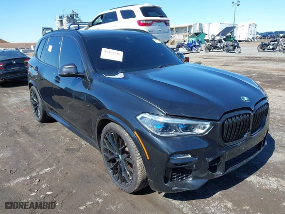 2019 BMW X5 xDrive50i with VIN 5UXJU2C5XKLN66873, listed as a IAAI auction lot 41472246 with 98,571 mi miles. Bid and sale history available at carsss.com. Image 1.