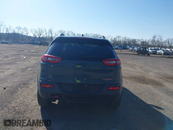 2014 Jeep Cherokee Trailhawk with VIN 1C4PJMBS4EW179763, listed as a IAAI auction lot 41988048 with 152,681 mi miles. Bid and sale history available at carsss.com. Image 17.