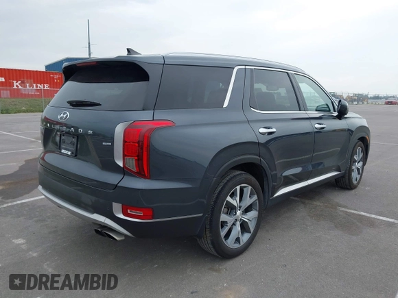 2021 Hyundai Palisade SEL with VIN KM8R4DHE0MU205427, listed as a IAAI auction lot 42436615 with 53,759 mi miles and . Bid and sale history available at DreamBid. Image 4.