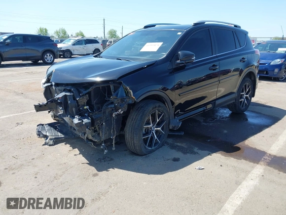 2016 Toyota RAV4 SE with VIN 2T3JFREV6GW492731, listed as a IAAI auction lot 41993874 with 92,339 mi miles and . Bid and sale history available at DreamBid. Image 2.