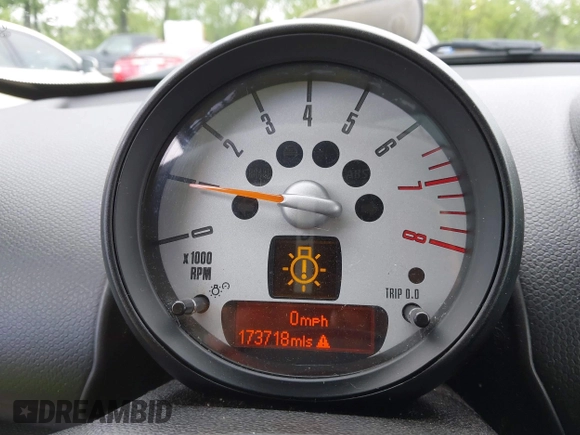 2011 MINI Countryman S with VIN WMWZC5C53BWM11022, listed as a IAAI auction lot 42249403 with 173,718 mi miles and . Bid and sale history available at DreamBid. Image 15.