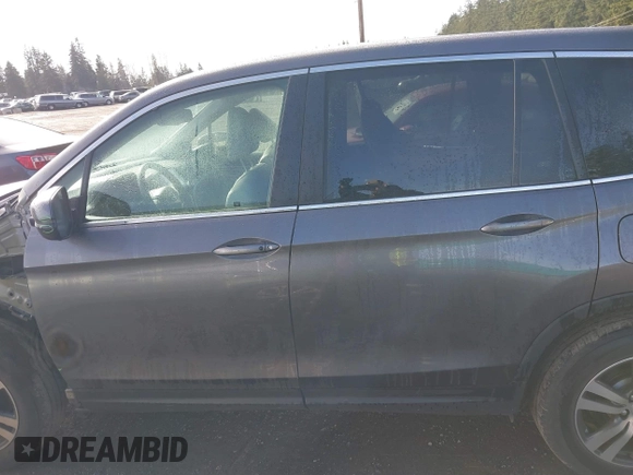 2017 Honda Pilot EX-L with VIN 5FNYF6H5XHB059834, listed as a IAAI auction lot 41670003 with 58,285 mi miles and . Bid and sale history available at DreamBid. Image 15.