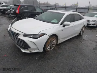 2020 Toyota Avalon Hybrid Limited with VIN 4T1C21FB9LU016373, listed as a IAAI auction lot 41536148 with 104,675 mi miles. Bid and sale history available at carsss.com. Image 2.