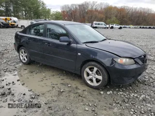 2006 Mazda 3 i Touring with VIN JM1BK32G761490132, listed as a Copart auction lot 52937645 with 146,299 mi miles and Salvage Title. Bid and sale history available at DreamBid. Image 4.