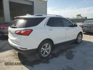 2020 Chevrolet Equinox Premier z VIN 2GNAXNEV5L6201364, wystawiony jako Copart lot #53293525 z przebiegiem Nie podano mil oraz Szkoda całkowita • Salvage title. Historia ofert i sprzedaży dostępna na DreamBid. Obrazek 3.