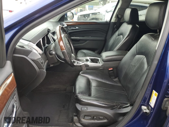 2012 Cadillac SRX Performance Collection with VIN 3GYFNBE35CS579214, listed as a Copart auction lot 54725465 with 114,829 mi miles and Salvage title. Bid and sale history available at DreamBid. Image 7.