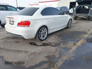 2013 BMW 1 Series 135i with VIN WBAUC9C52DVM13628, listed as a IAAI auction lot 41901475 with 113,598 mi miles and . Bid and sale history available at DreamBid. Image 4.