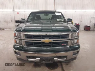 2015 Chevrolet Silverado 1500 LT with VIN 1GCVKREC2FZ147321, listed as a IAAI auction lot 41995003 with 148,053 mi miles and . Bid and sale history available at DreamBid. Image 13.