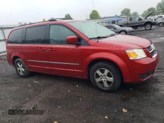 2010 Dodge Grand Caravan SXT z VIN 2D4RN5D10AR179773, wystawiony jako Copart lot #56855235 z przebiegiem 239 925 mil mil oraz Nie do naprawy • Non repairable. Historia ofert i sprzedaży dostępna na DreamBid. Obrazek 4.