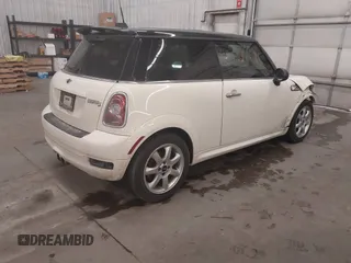 2010 MINI Hardtop S with VIN WMWMF7C50ATZ71884, listed as a IAAI auction lot 41731490 with 55,864 mi miles and . Bid and sale history available at DreamBid. Image 4.