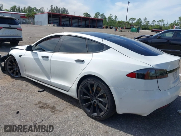 2020 Tesla Model S Long Range with VIN 5YJSA1E2XLF360260, listed as a IAAI auction lot 41241778 with 141,594 mi miles. Bid and sale history available at carsss.com. Image 3.