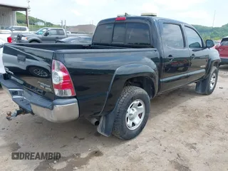 2015 Toyota Tacoma PreRunner with VIN 3TMJU4GN5FM189557, listed as a IAAI auction lot 42387542 with 189,188 mi miles and . Bid and sale history available at DreamBid. Image 4.
