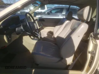 1988 Mercedes-Benz 300 with VIN WDBEA50D9JA698251, listed as a Copart auction lot 46977055 with 107,949 mi miles and Salvage Title. Bid and sale history available at DreamBid. Image 7.