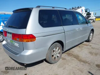 2003 Honda Odyssey EX-L with VIN 5FNRL18903B075004, listed as a IAAI auction lot 41954985 with 225,907 mi miles and . Bid and sale history available at DreamBid. Image 4.