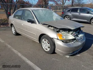 2002 Honda Civic LX with VIN 2HGES16642H552358, listed as a IAAI auction lot 40757858 with 138,320 mi miles. Bid and sale history available at carsss.com. Image 1.