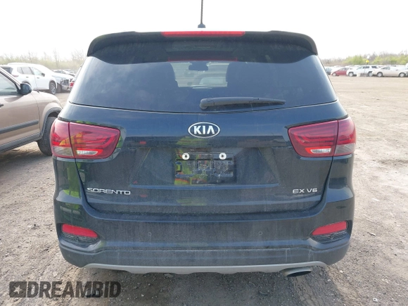 2020 Kia Sorento EX z VIN 5XYPHDA58LG708648, wystawiony jako IAAI lot #42022837 z przebiegiem 80 127 mil mil oraz . Historia ofert i sprzedaży dostępna na DreamBid. Obrazek 16.