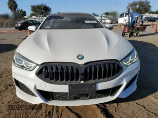 2022 BMW 8 Series 840i with VIN WBAGV2C0XNCG81832, listed as a Copart auction lot 74798684 with 27,972 mi miles and Salvage Title. Bid and sale history available at carsss.com. Image 5.