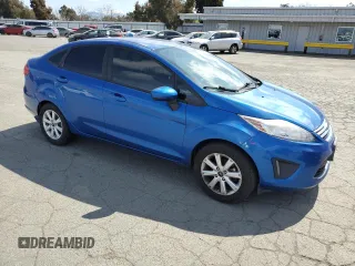 2011 Ford Fiesta SE with VIN 3FADP4BJ2BM154564, listed as a Copart auction lot 50823515 with 59,016 mi miles and Clean Title. Bid and sale history available at carsss.com. Image 4.