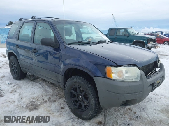 2003 Ford Escape XLS Popular with VIN 1FMYU92153KE01890, listed as a IAAI auction lot 41605087 with 109,411 mi miles. Bid and sale history available at carsss.com. Image 1.