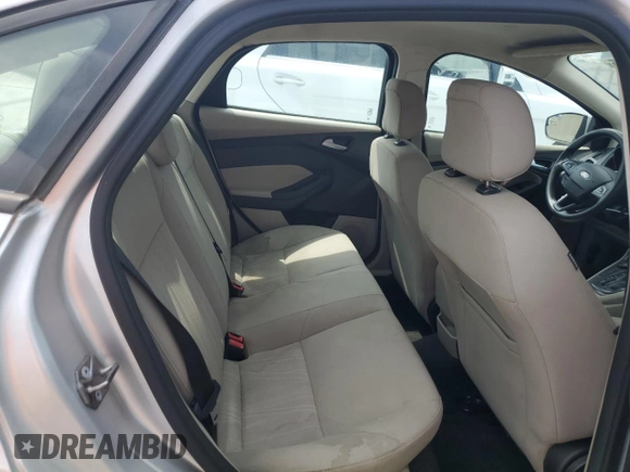 2018 Ford Focus SE z VIN 1FADP3F27JL250591, wystawiony jako Copart lot #54989245 z przebiegiem 85 838 mil mil oraz Szkoda całkowita • Salvage title. Historia ofert i sprzedaży dostępna na DreamBid. Obrazek 10.
