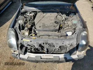 2003 Infiniti G35 w/Leather with VIN JNKCV51E93M313940, listed as a Copart auction lot 65704024 with 132,397 mi miles and Salvage Title. Bid and sale history available at carsss.com. Image 11.