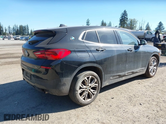 2018 BMW X2 xDrive28i with VIN WBXYJ5C30JEF69802, listed as a IAAI auction lot 42061382 with 55,138 mi miles. Bid and sale history available at carsss.com. Image 4.