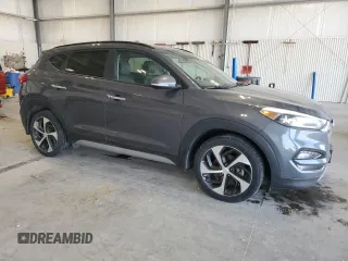 2017 Hyundai Tucson Sport with VIN KM8J3CA20HU594697, listed as a Copart auction lot 54252355 with 98,696 mi miles and Salvage Title. Bid and sale history available at DreamBid. Image 4.