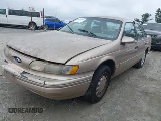 1993 Ford Taurus with VIN 1FALP5343PA153390, listed as a IAAI auction lot 42559003 with 64,617 mi miles and . Bid and sale history available at DreamBid. Image 2.