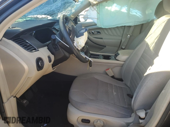 2015 Ford Taurus SE with VIN 1FAHP2D80FG116704, listed as a Copart auction lot 73571034 with 85,665 mi miles and Salvage Title. Bid and sale history available at DreamBid. Image 7.