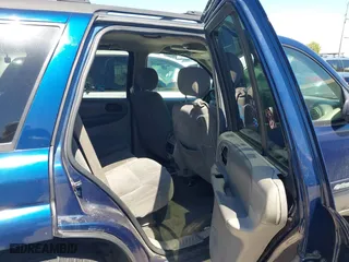 2003 Chevrolet TrailBlazer LS with VIN 1GNDS13S832174543, listed as a IAAI auction lot 42087307 with 123,519 mi miles. Bid and sale history available at carsss.com. Image 8.