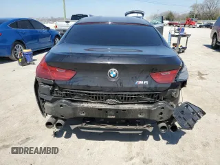 2016 BMW M6 z VIN WBS6E9C50GGF92519, wystawiony jako Copart lot #47774004 z przebiegiem 86 679 mil mil oraz Szkoda całkowita • Salvage title. Historia ofert i sprzedaży dostępna na DreamBid. Obrazek 6.