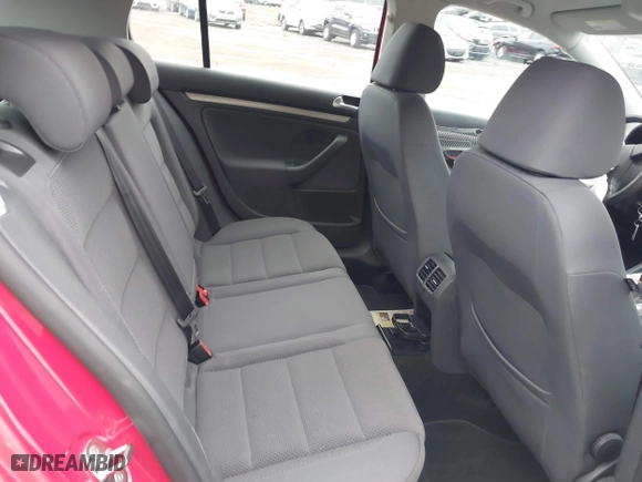 2009 Volkswagen Rabbit S with VIN WVWDB71K59W118060, listed as a IAAI auction lot 41560708 with 63,745 mi miles. Bid and sale history available at carsss.com. Image 8.