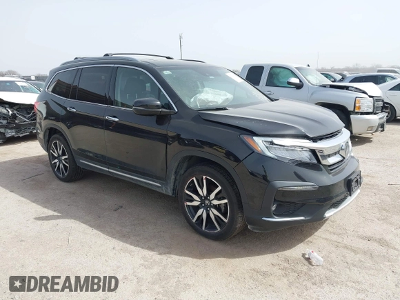 2020 Honda Pilot Touring 8-Passenger with VIN 5FNYF6H91LB003552, listed as a IAAI auction lot 41743685 with 76,725 mi miles and . Bid and sale history available at DreamBid. Image 1.