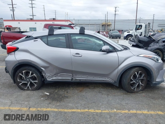 2018 Toyota C-HR XLE with VIN NMTKHMBX8JR032422, listed as a IAAI auction lot 42038240 with 132,553 mi miles and . Bid and sale history available at DreamBid. Image 13.